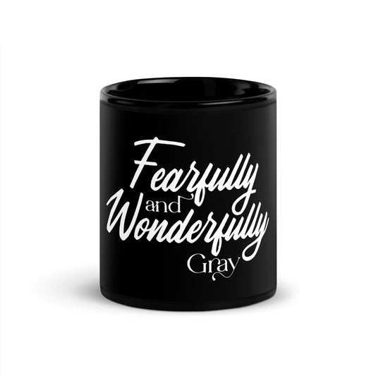 Sipping from the Fountain of Fearfully and Wonderfully Gray in a Black Glossy Mug